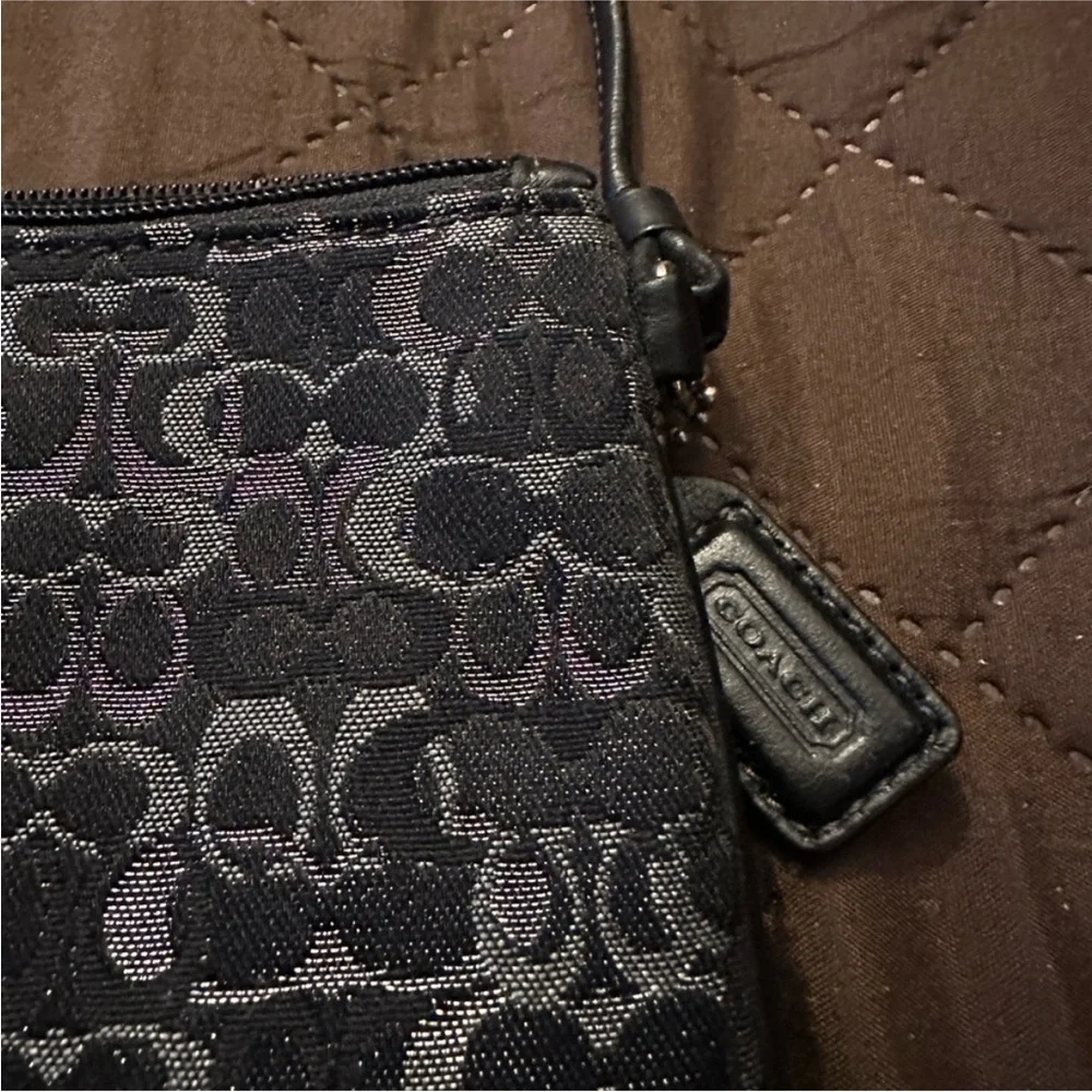 Coach Monogram Wristlet in Black silver with Metallic Elements and leather strap